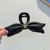 Chanel Bow Shark Hair Clip with Pearl Logo in PVC Black