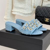 Chanel Heeled Slides with Large Woven Chain Women in Quilted Denim Blue