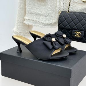 Chanel Double Bow 55 Slides Women in Silk Black