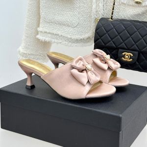Chanel Double Bow 55 Slides Women in Silk Pink