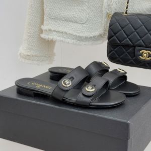 Chanel Slides with Enamel Logo Buttons Women in Lambskin Black